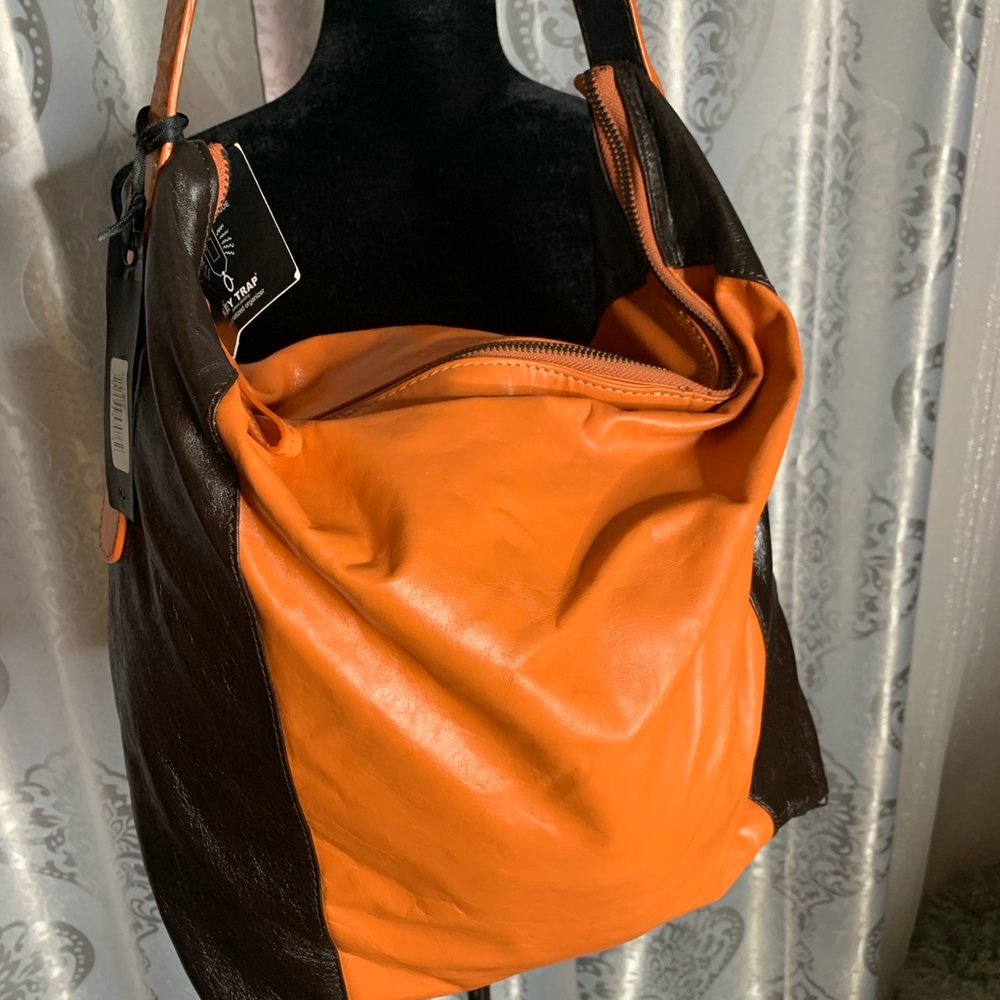 Orange chocolate brown  big enough for overnight magnetic key holder included